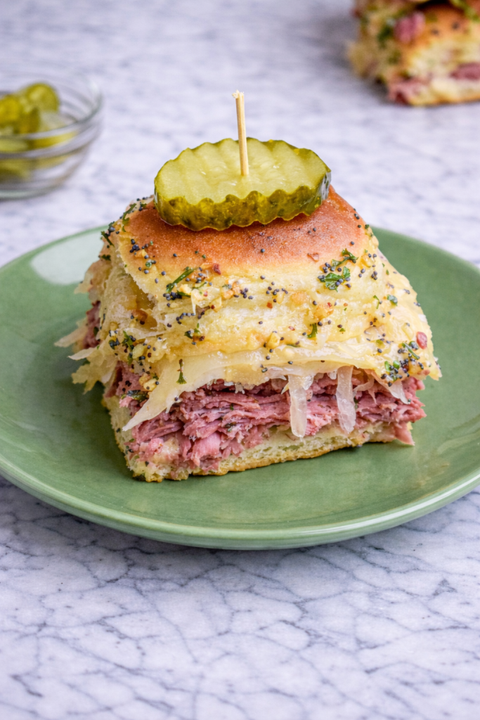 Cornbeef Reuben Sliders on a green plate