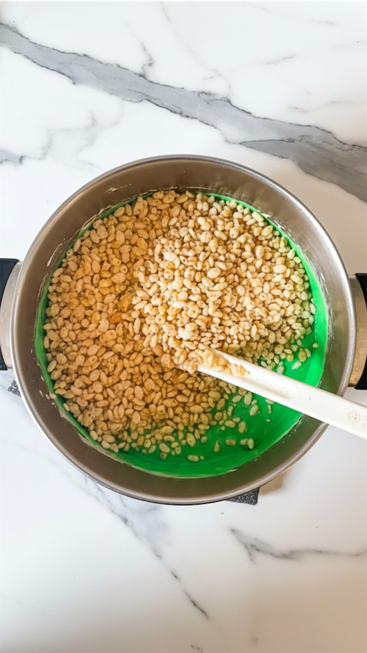 rice krispies and green mixture in a bowl