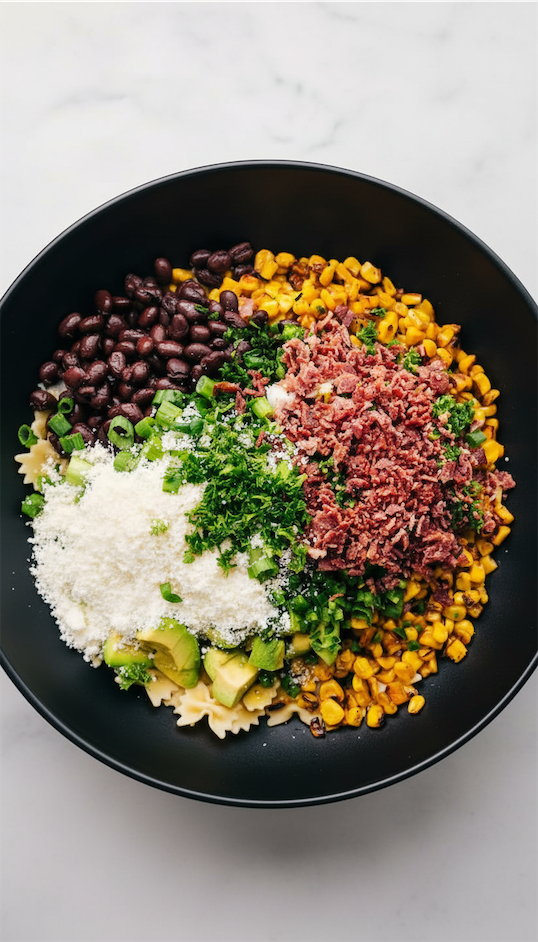 Mexican Street Corn Pasta in black bowl